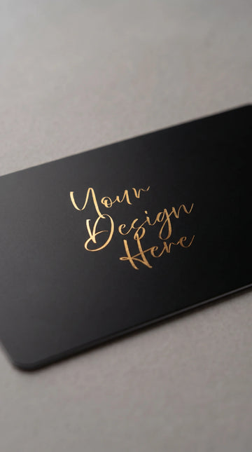 Close up of a black freelancer card with gold foil