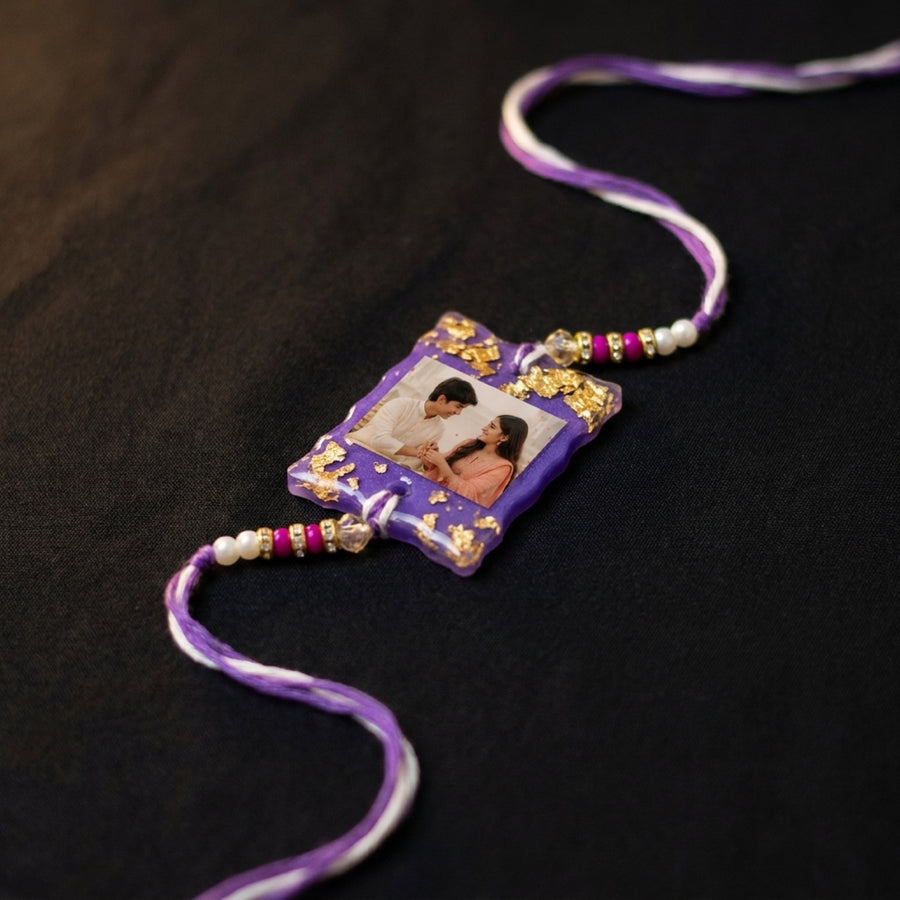 Personalised rakhi with photo set into the resin pendant — custom rakhi for brother, Rs. 699