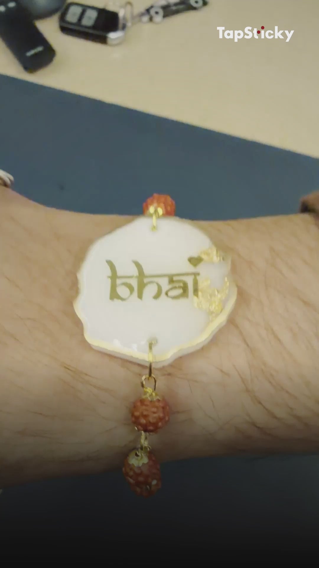 Phone tapped on a smart NFC rakhi opens a personal Raksha Bandhan message and a send a wish page